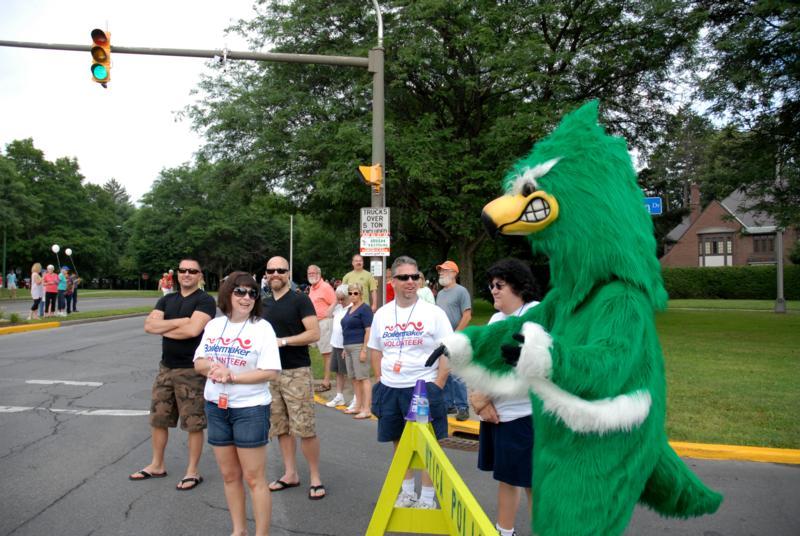 Mo on line Mascot Mo cheering on participants in boiler maker run