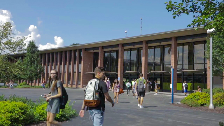 Students outside of Academic Building of MVCC Utica Campus