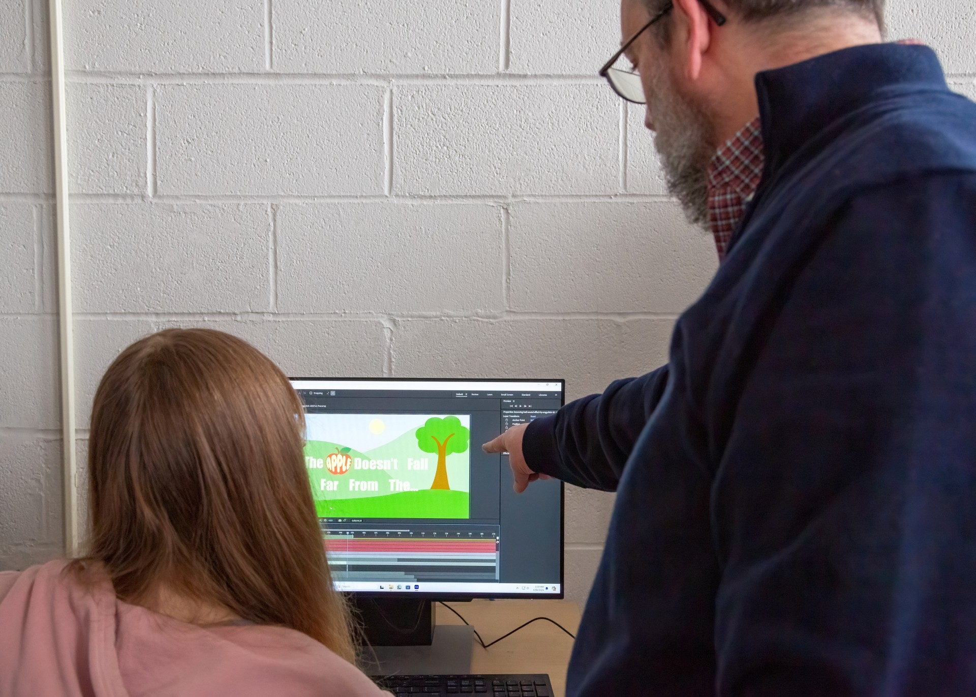 Image of student working on digital artwork on computer