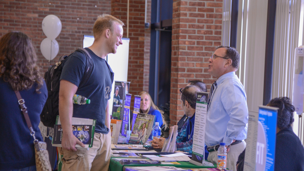 Students asking questions about college transfer