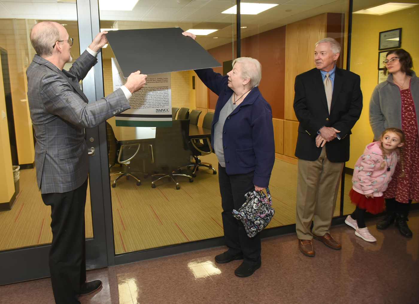 MVCC President unveils plaque at Russel C. Fielding conference room naming