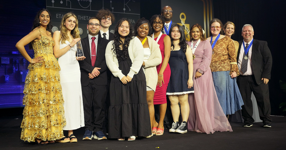 MVCC PTK students and advisors all dressed up, standing together at the 2025 Catalyst international convention
