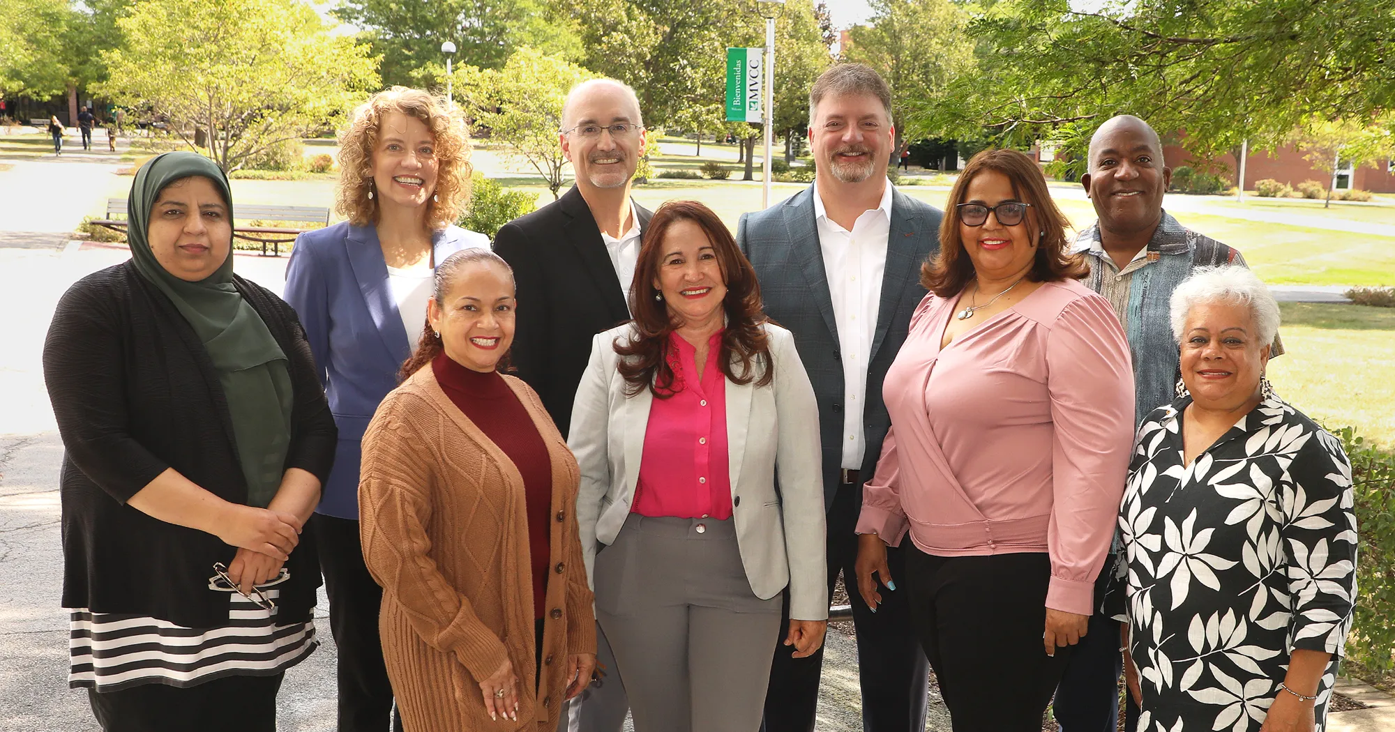 UASD faculty visit Image of nine people standing together on the MVCC Campus