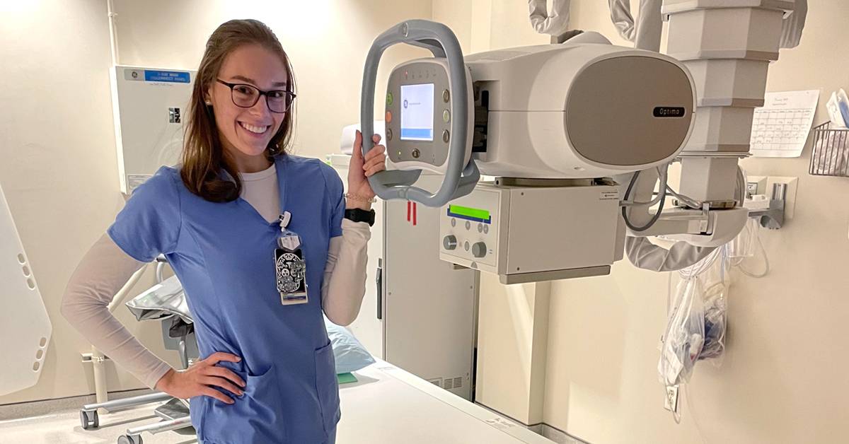 Alexis Race - Radiologic Technologist Image of Radiologic Technologist Alexis Race at hospital with scanning equipment